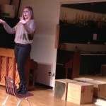 Blake High freshman Samantha Ely sings for visitors from Magnet Schools of America.