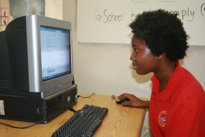 Eighth-grader Auzje Middleton takes English online through Florida Virtual School. She likes the set-up because "there's not a lot of distraction with other kids.''