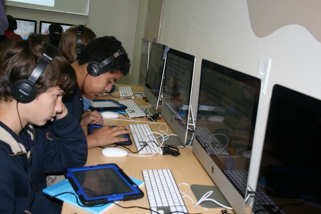 Students at Dayspring Academy Middle School, a charter school in New Port Richey, Fla., use iPads and deskstop computers to work on Algebra problems. The school serves as an example of what some key Florida lawmakers hope becomes the norm in public schools statewide.