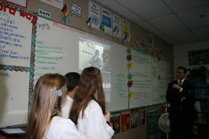 Florida House Speaker Will Weatherford watches a Dayspring Academy student's Vine video on the American Revolution.